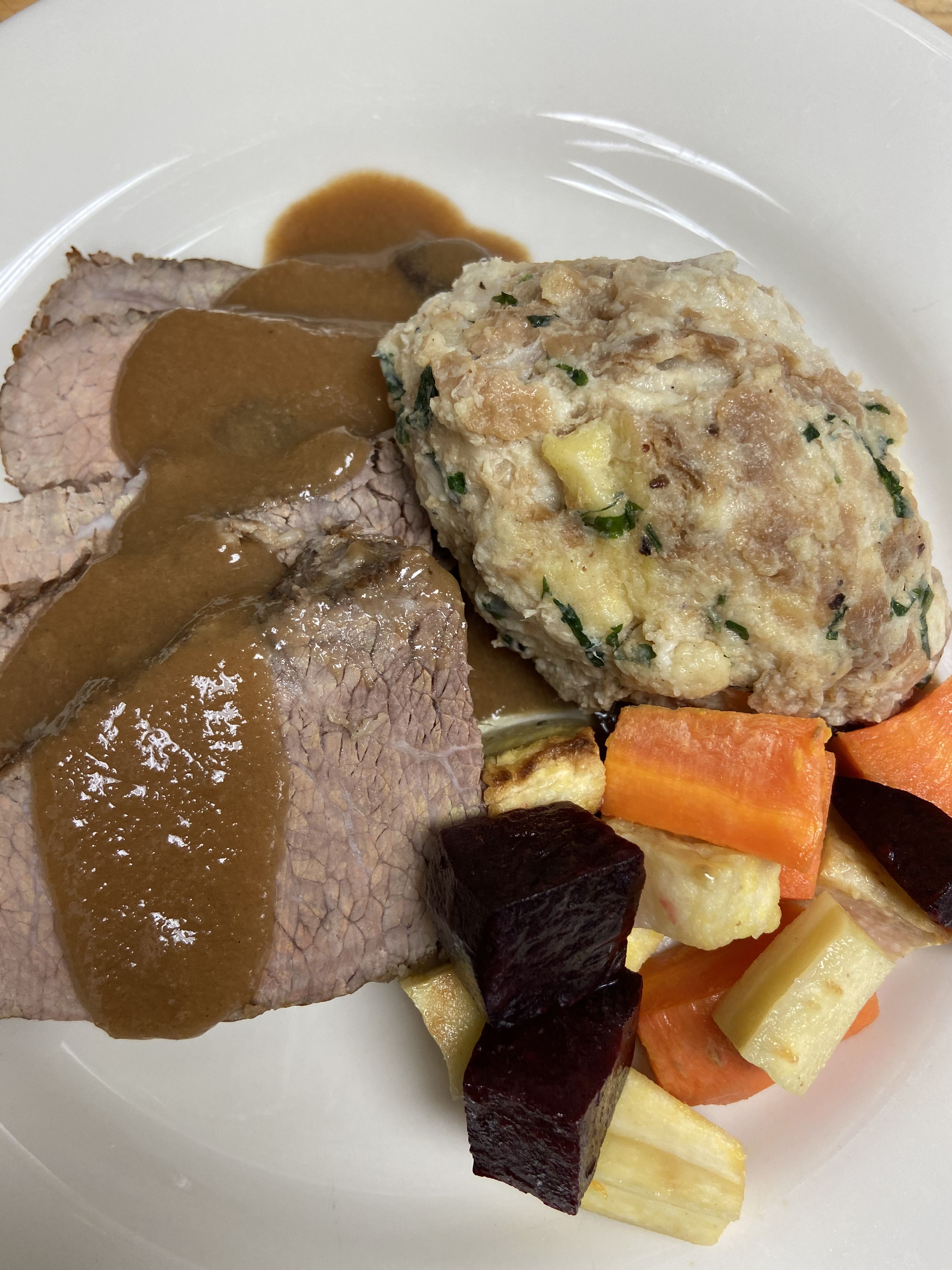 Sauerbraten with Knodel and Roasted Root Vegetables